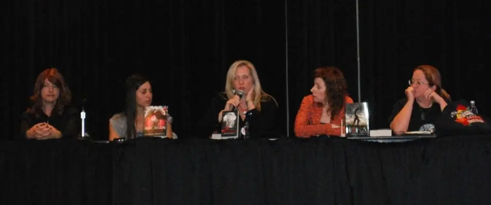 Kristen Painter with the Blood Rights cover on a paranormal author panel at Comic Con New York.