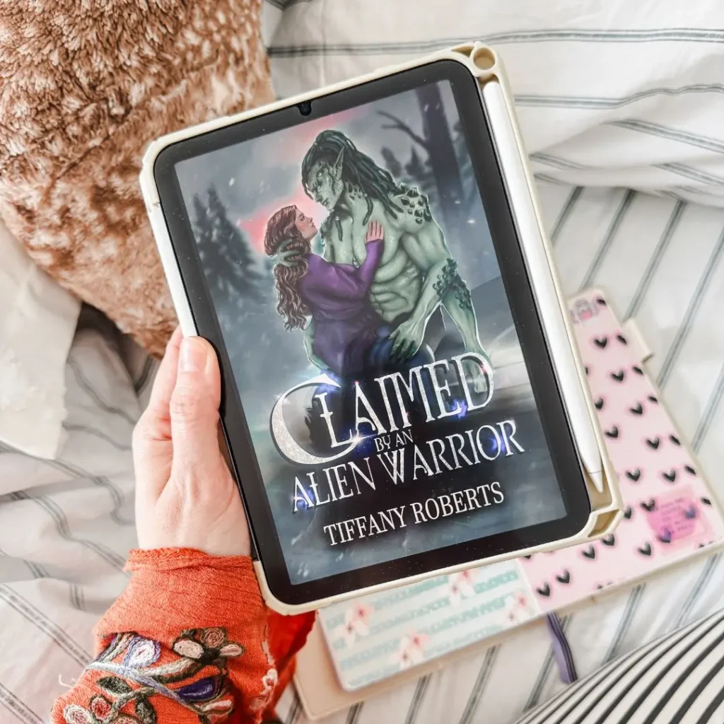 Weirdly Unique and Addictive Monster Romances - Pictured Claimed by the Alien Warrior by Tiffany Roberts on a ipad mini