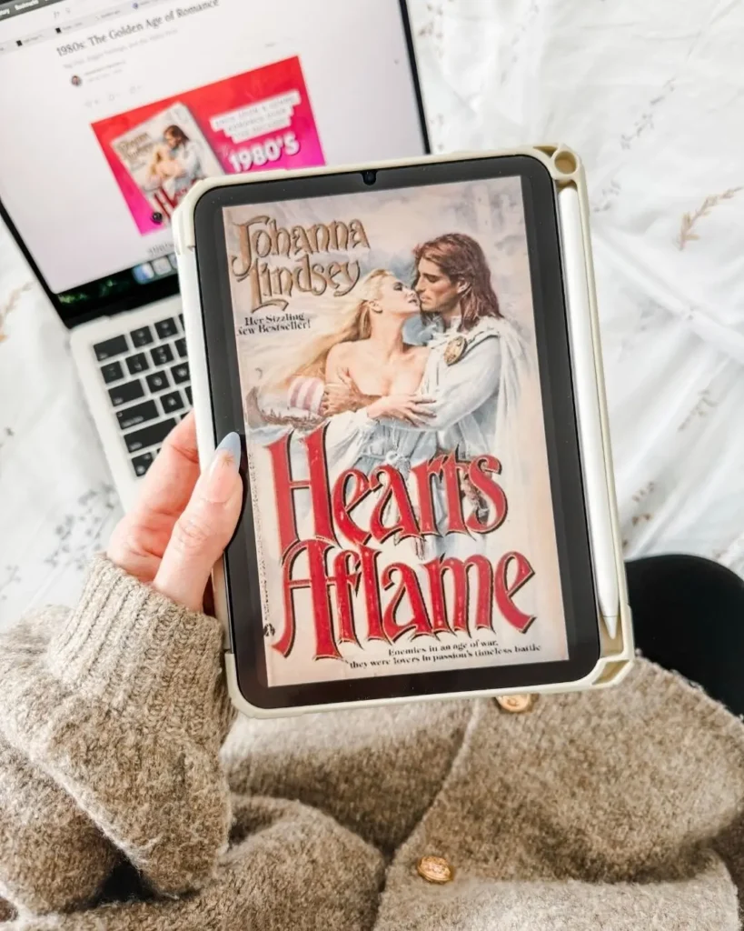 History of 1980s Romance Novels - cover of Hearts Aflame by Johanna Lindsey displayed on an iPad 