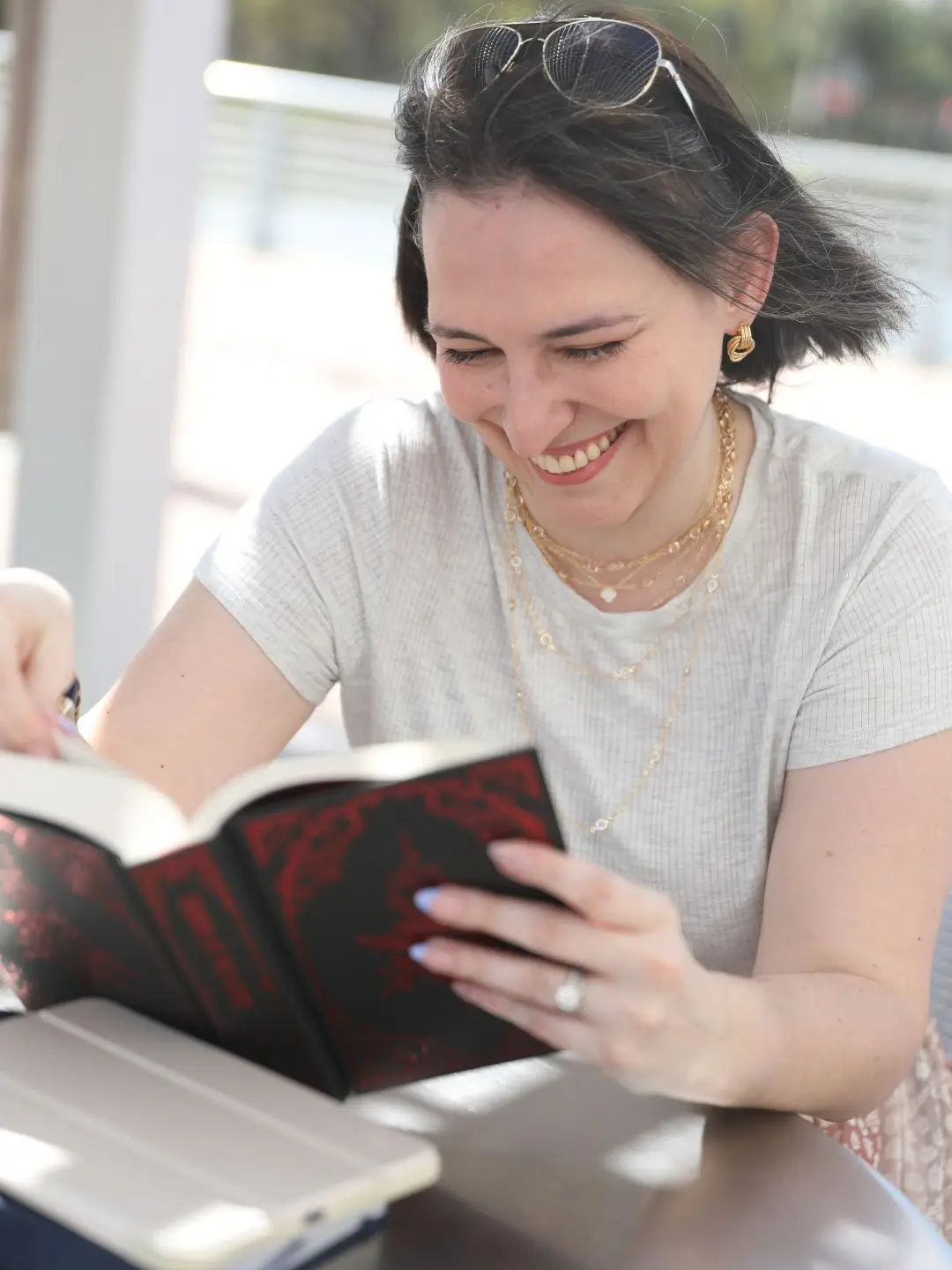 Francesca reading a special edition romance novel