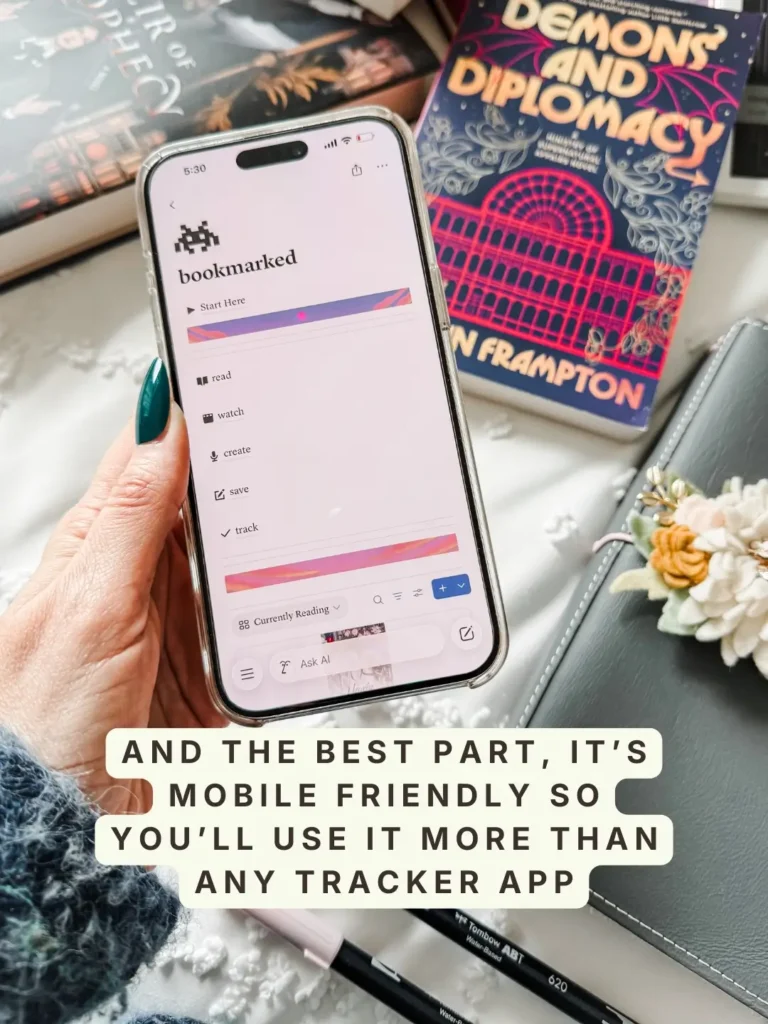 Bookmarked open on an iPhone with its read, watch, create, save and track sections. Caption: And the best part, it's mobile friendly so you'll use it more than any tracker app.