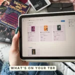 The TBR view in Bookmarked, book covers grouped by the month they're due with release dates and ARC tags. Caption: What's on your TBR.